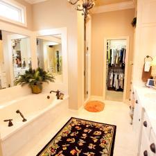 Transitional Master Bathroom with long horizontal window above tub