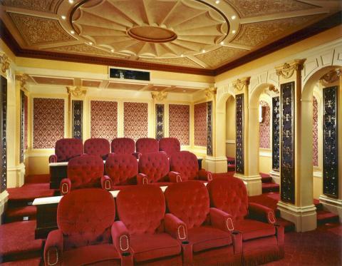 Traditional Home Theater with detailed columns with carvings