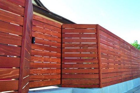 Modern Home Exterior with redwood fence and gate