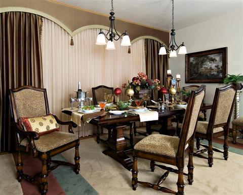 Traditional Dining Room with heavy renaissance influenced chairs