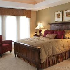 Traditional Bedroom with wooden head board and foot board
