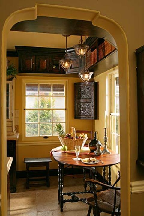 Traditional Kitchen with dark wood crown moulding