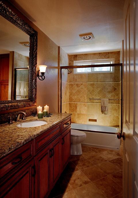 Traditional Bathroom with elegant designed framed vanity mirror