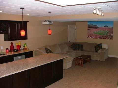 Traditional Basement with built-in wine bottle rack