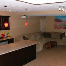 Traditional Basement with built-in wine bottle rack