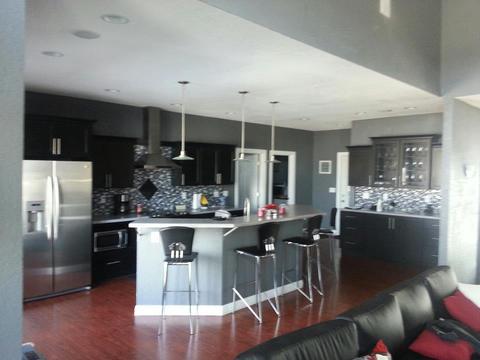 Contemporary Kitchen with side by side refrigerator