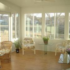 Traditional Sunroom with glass top occasional tables