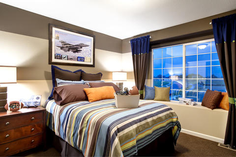 Transitional Kids Room with painted striped on wall