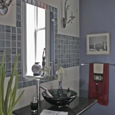 Eclectic Bathroom with wall mounted granite counter
