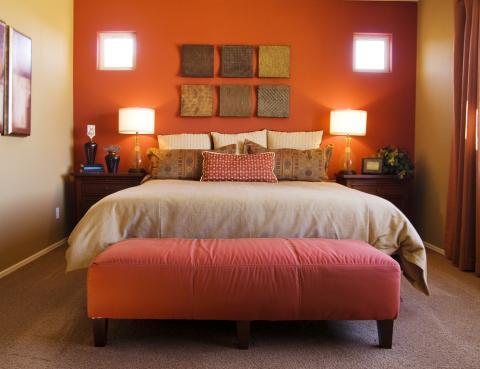 Eclectic Bedroom with glass base bedside reading lamps