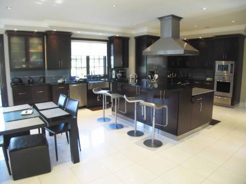Contemporary Dining Room with frosted glass paneled cabinet