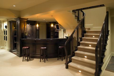Traditional Basement with lights in stair risers