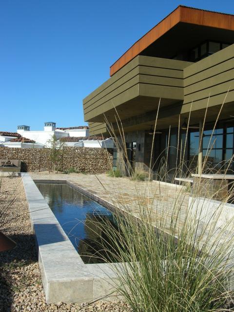 Modern Home Exterior with floor to ceiling window
