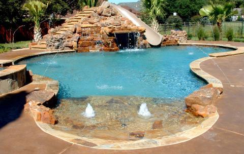 Transitional Pool with dark wood privacy fence
