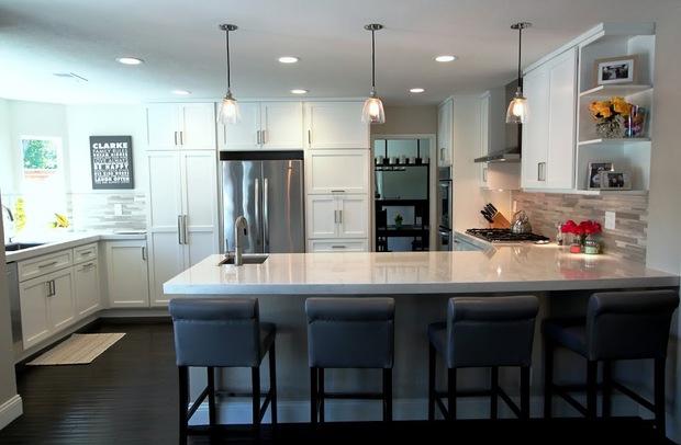 Transitional Kitchen with high end stainless steel refrigerator