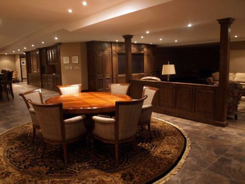 Traditional Basement with lots of built in storage