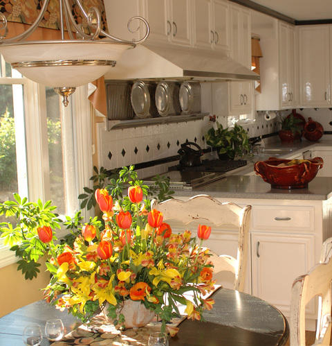 Transitional Dining Room with white and black tile back splash