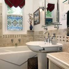 Eclectic Bathroom with faucet fixture mounted on wall