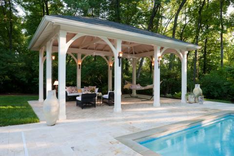 Transitional Patio with large trees around property
