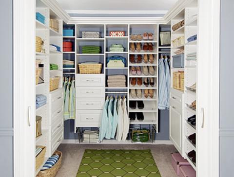 Transitional Closet with custom closet organizational storage units