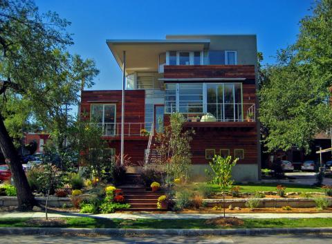 Modern Home Exterior with white framed windows and doors