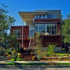Modern Home Exterior with white framed windows and doors