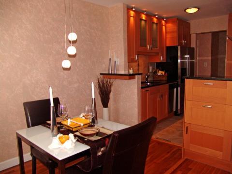 Modern Dining Room with ceiling mounted light fixture