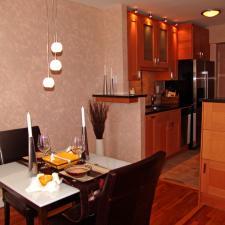 Modern Dining Room with ceiling mounted light fixture
