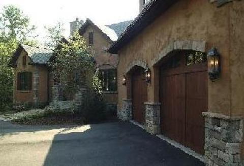Traditional Garage with windows on top of garage door