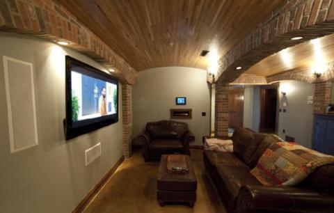 Transitional Home Theater with recessed can lights in brick ceiling detail