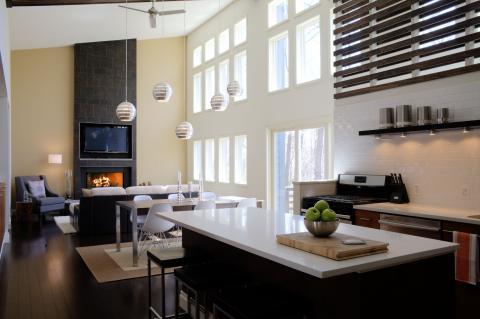Contemporary Family Room with white glossy tile back splash accent wall