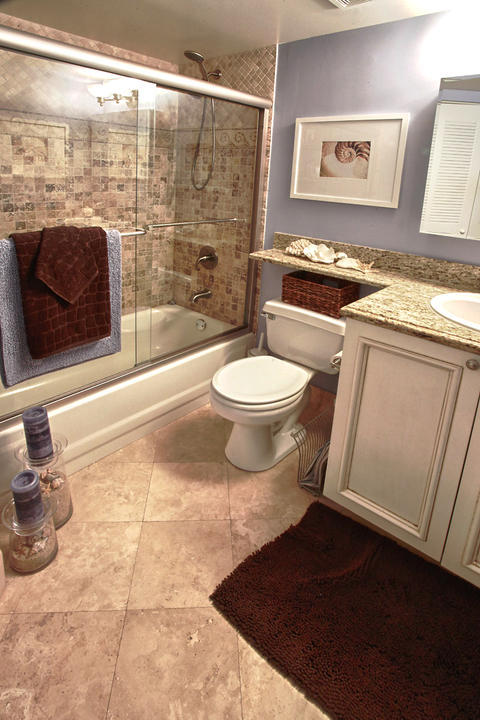 Traditional Bathroom with chrome framed sliding glass door