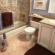 Traditional Bathroom with clear glass sliding shower door