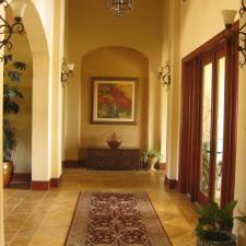 Traditional Entry with dark wood and glass door