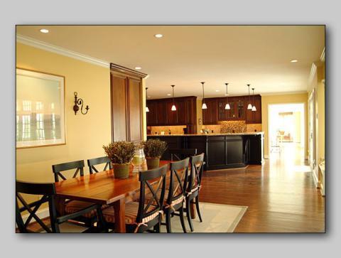 Traditional Dining Room with dark wood rectangular dining table