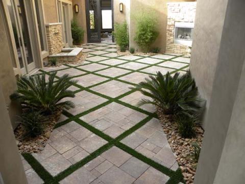 Traditional Patio with wrought iron scrollwork door