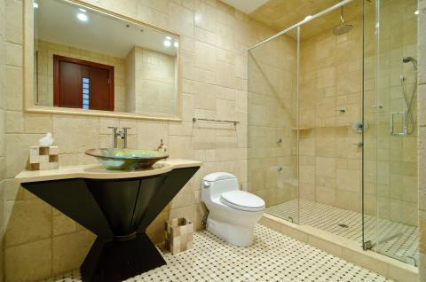Eclectic Bathroom with coordinating tissue box and garbaed can
