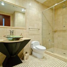 Eclectic Bathroom with coordinating tissue box and garbaed can