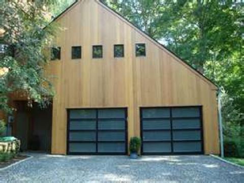 Modern Home Exterior with black framed windows and doors