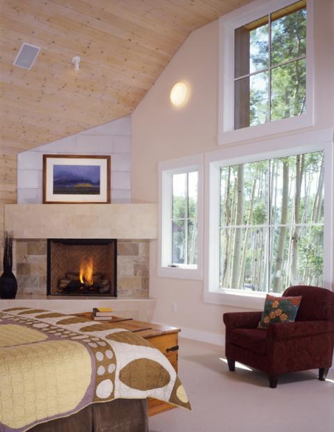 Contemporary Bedroom with natural wood ceiling panels