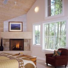 Contemporary Bedroom with natural wood ceiling panels