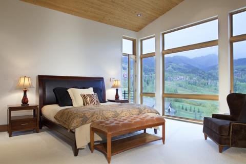 Traditional Bedroom with salmon colored velvet bench