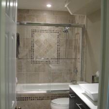 Transitional Bedroom with chrome framed glass shower door