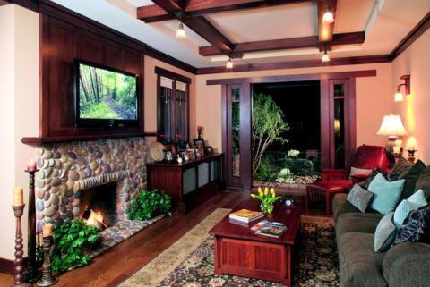 Traditional Family Room with river rock fire place surround
