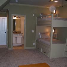 Traditional Kids Room with soft green painted room