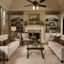 Transitional Family Room with white wood built-in cabinets
