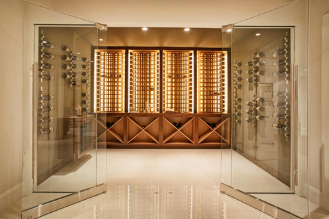Contemporary Wine Cellar with in cabinet lighting