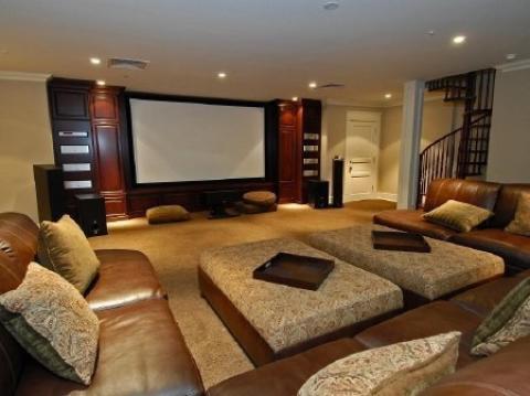 Contemporary Home Theater with fabric and leather upholstery