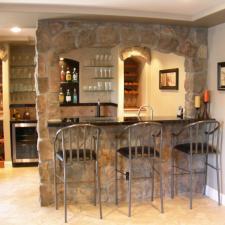 Traditional Basement with built in wine glass rack