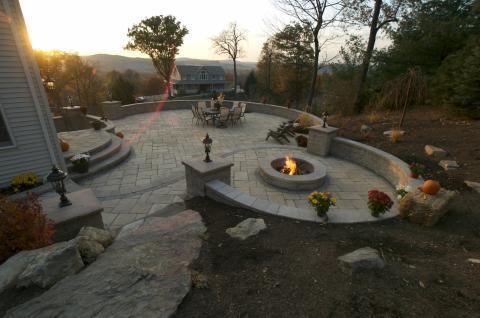 Contemporary Patio with wide round stone steps